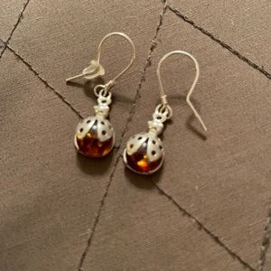 Unmarked silver and amber ladybug earrings.